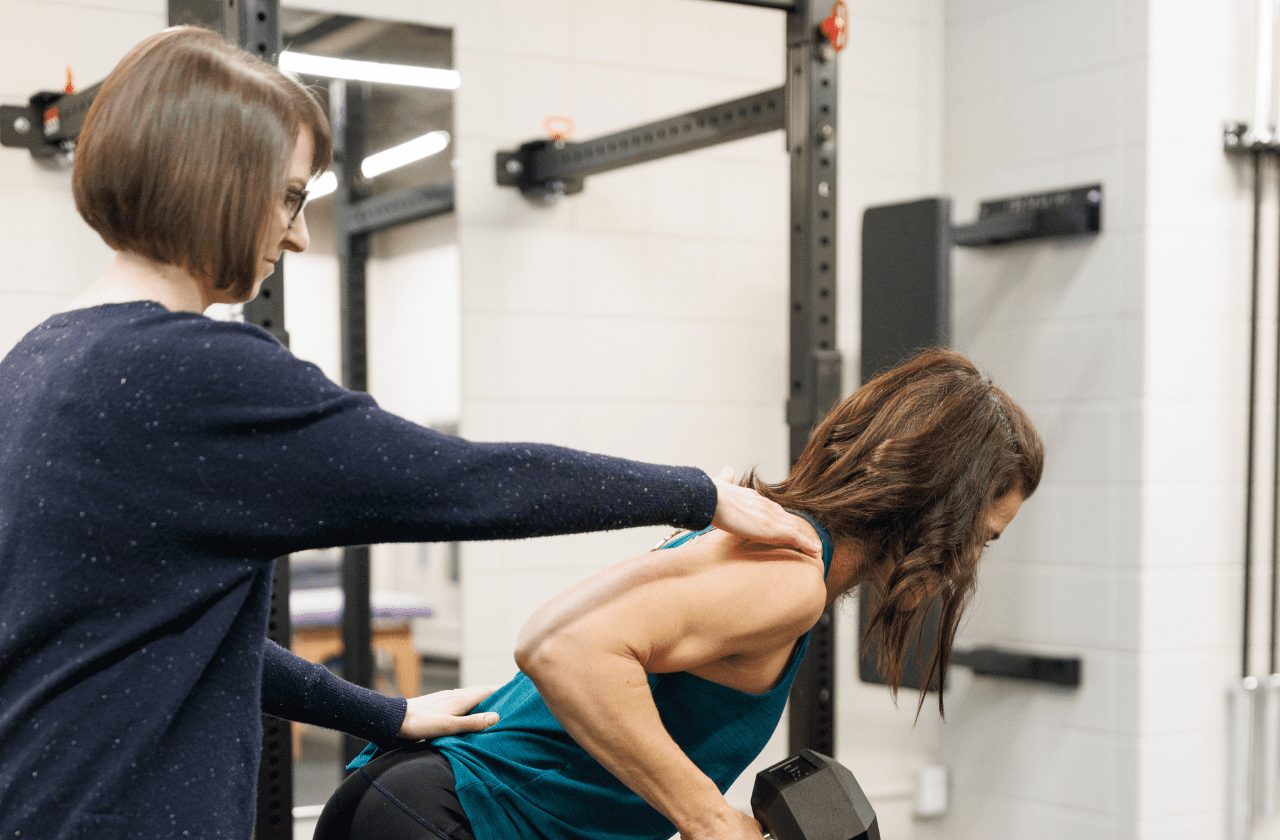 HORIZONTAL PHOTO (1280 × 840 px) physical therapy hands on cueing